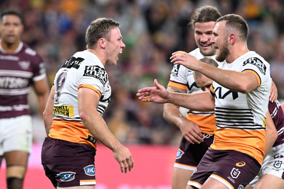 Billy Walters (left) celebrates his try during the round 10 match with Manly.