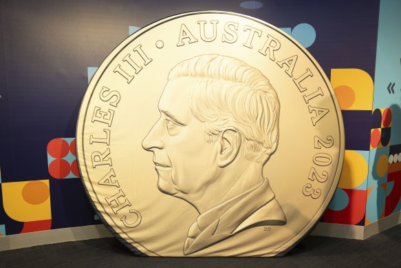 A mockup of a coin at an event to release the new effigy of King Charles III that will appear on Australian coins.