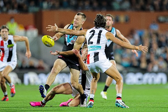 Robbie Gray avoids the Saints’ defence. 