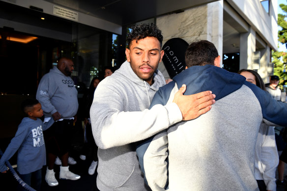 Players outside the Pullman hotel at Olympic Park, one of the venues expected to hold players in solitary confinement for 14 days.