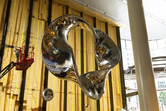 A four-metre steel sculpture dangles from the ceiling of the northern entrance.