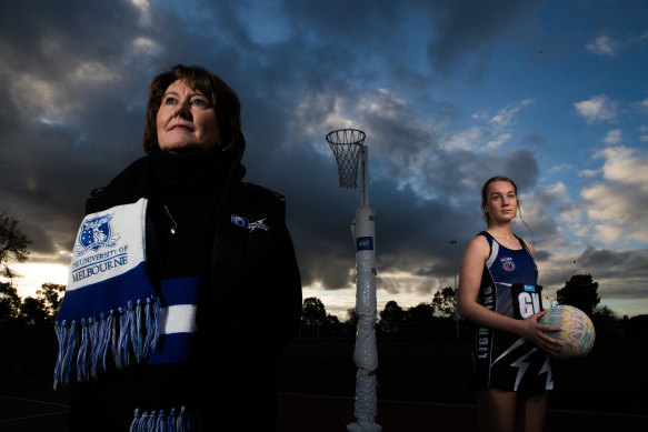 Melbourne University Lightning Netball Club president Lindy Murphy (left) with Lucy Bingle at a netball court in Ivanhoe on Tuesday. Murphy says the club has had to rewrite its budget many times due to the stop-start nature of the shutdowns.