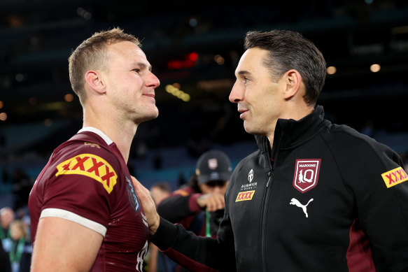 Maroons captain Daly Cherry-Evans and Maroons head coach Billy Slater celebrate victory after game one.