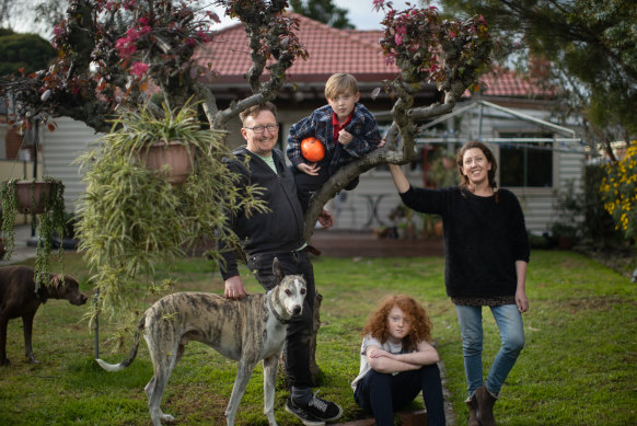 Jessica and Craig Smith, and their sons Ethan and Eli, with dogs Rosie and Rufus, are selling their Coburg North home.
