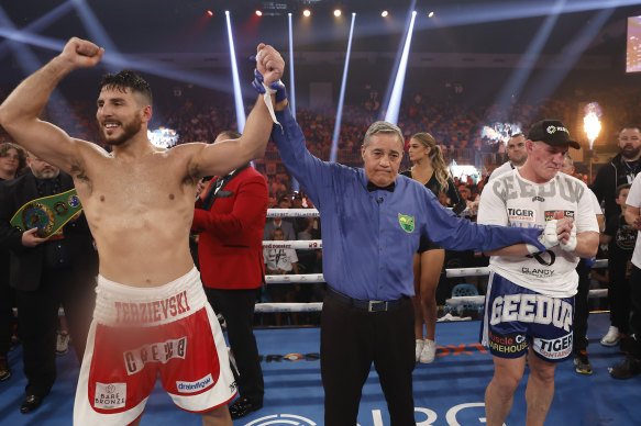 Kris Terzievski celebrates his victory over Paul Gallen at Newcastle Entertainment Centre.