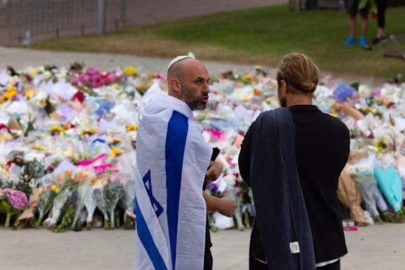 Mourners at the Bondi Pavilion  this morning.