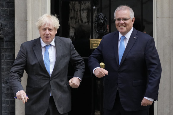 Britain’s Prime Minister Boris Johnson greets Australia’s Prime Minister Scott Morrison outside 10 Downing Street, in London.