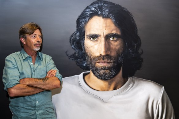 Angus McDonald with his winning portrait of Kurdish-Iranian writer Behrouz Boochani.