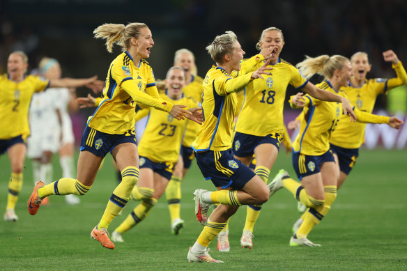 Lina Hurtig and team Sweden celebrate after defeating the USA in penalty shootout.