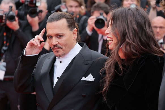 Johnny Depp and actor-director Maiwenn on the red carpet.