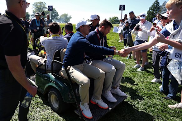 McIlroy got a lift off the course after withdrawing from his practice round.