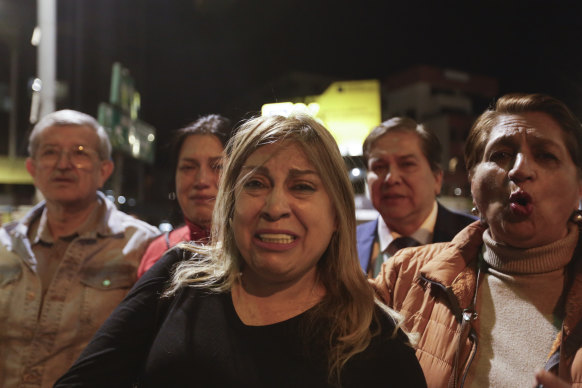 Alexandra Villavicencio, sister of presidential candidate Fernando Villavicencio, arrives to the hospital that he was taken after being shot.