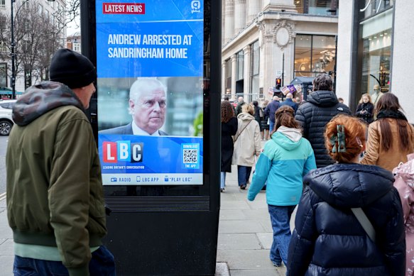 After his arrest, the face of Andrew Mountbatten-Windsor is displayed on a news screen on Oxford Street, London.