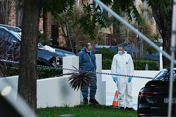NSW Police forensics officers at the Condell Park crime scene.