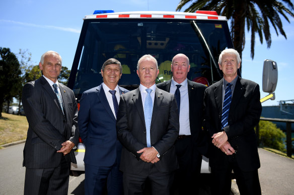 Former emergency services chiefs Bob Conroy, Lee Johnson, Greg Mullins, Mike Brown and Neil Bibby on Thursday.