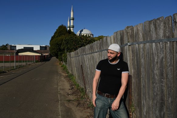 Dr Michael Mohammed Ahmad, who has written a play about xenophobia to be performed at the Sydney Opera House, pictured outside the Auburn Gallipoli Mosque.