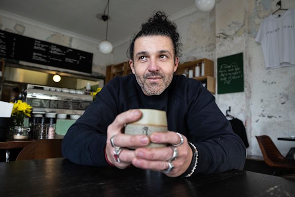 Riccardo Martins, owner of Meraki Coffee cafe, does not want to raise prices further. 