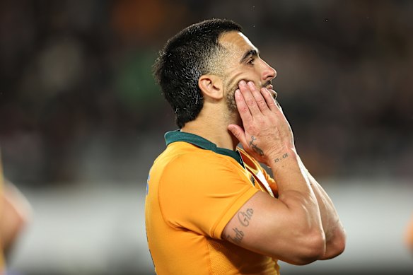 Tom Wright of Australia reacts to the loss.