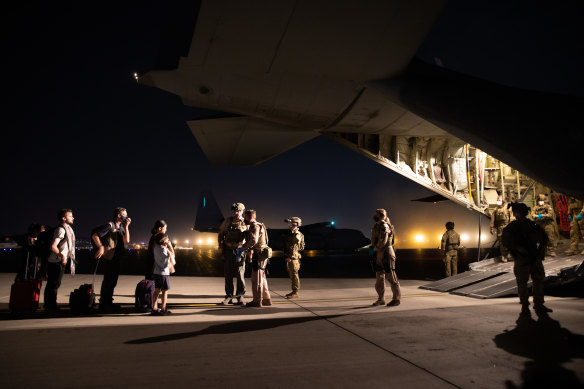 An Australian RAAF Hercules aircraft landed at Kabul airport to evacuate 26 people to a base in the UAE yesterday.