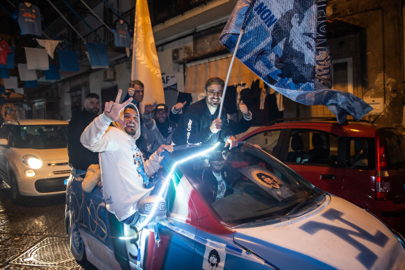 Napoli fans celebrate after winning the Serie A championship.