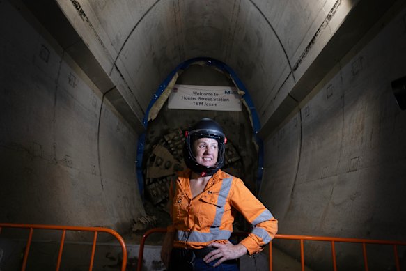 Sydney Metro project delivery head Angela Jeffery in front of the last boring machine to reach the cavern beneath Hunter Street.