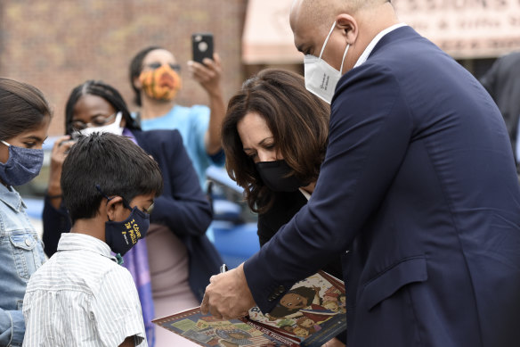 Then vice-presidential candidate Kamala Harris sings a book during a campaign stop in 2020. Her children’s book is called “Superheroes are everywhere”.