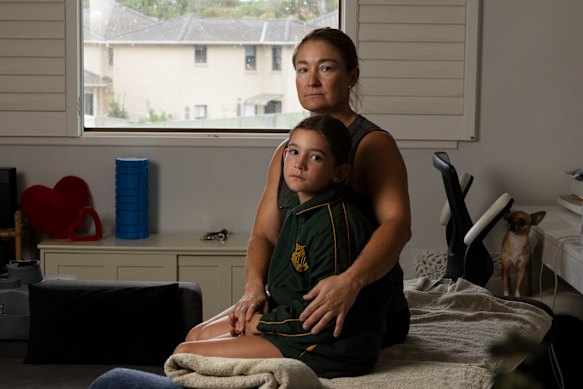 Cronulla remedial massage therapist Kari Larssen, with her daughter, Madison, has been hit hard by fuel increases. 