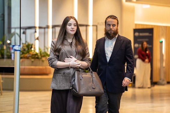  Sheina Gutnick, with  husband Joshy Gutnick, leaves after giving evidence in Sydney.