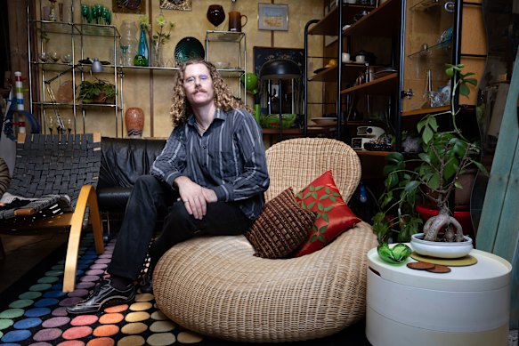 Jason Mumford at this vintage furniture store, Two Hands Collect, at Mitchell Road Antiques, with a number of his vintage IKEA finds, such as the Storvik Rattan armchair by Carl Öjerstam.