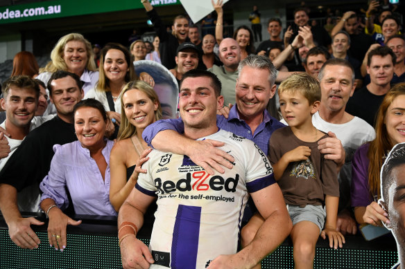 Bronson Garlick celebrates his NRL debut with family and friends.