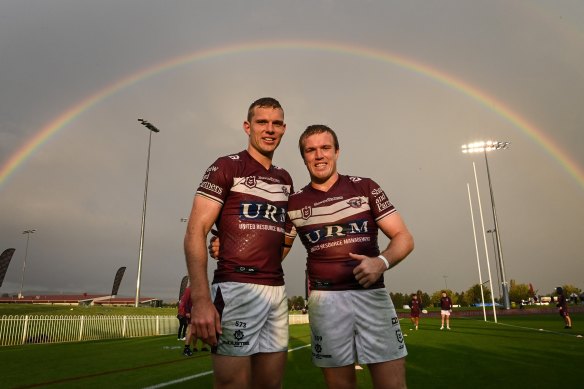 Jake Trbojevic with his brother Tom and a signature thumbs-up after a victory in Mudgee in 2021.