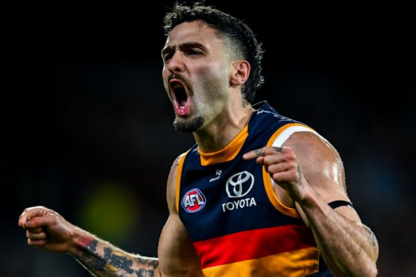 Izak Rankine of the Crows celebrates a goal.