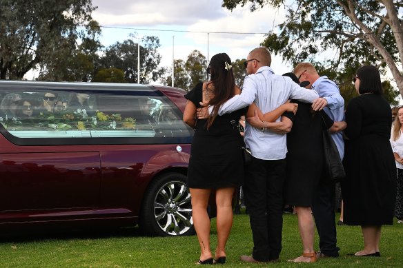 Mourners at the funeral of Molly Ticehurst on May 2. 