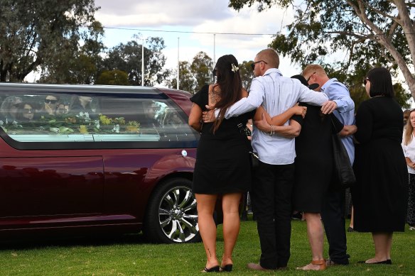 Mourners at the funeral of Molly Ticehurst on May 2.