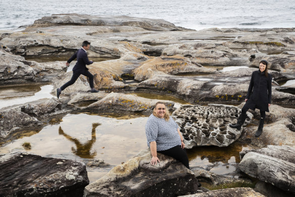 Architect Stephen Neille, local elder Noeleen Timbery, chair of the La Perouse Aboriginal Land Council,  and architect Rachel Neeson on a rock platform at Kurnell.