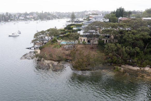 A tract of waterfront land has been cleared of hundreds of trees and plants.