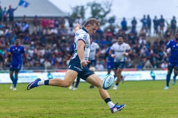 Max Jorgensen clearing the ball.