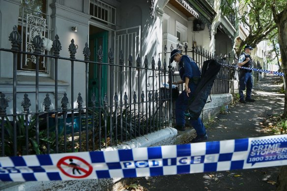 Police have established a crime scene at the Paddington terrace.