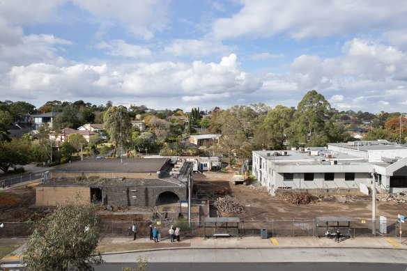 Demolition has begun at the old Rosanna library (left) to make way for a Woolworths and new community hub.