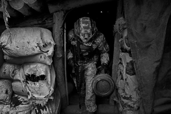 Maksym in the trenches on the Donbas front line.