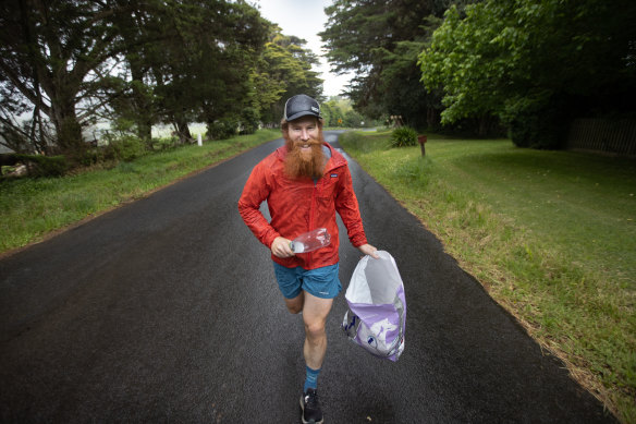 Beau Miles collecting cans and bottles in West Gippsland on Tuesday.
