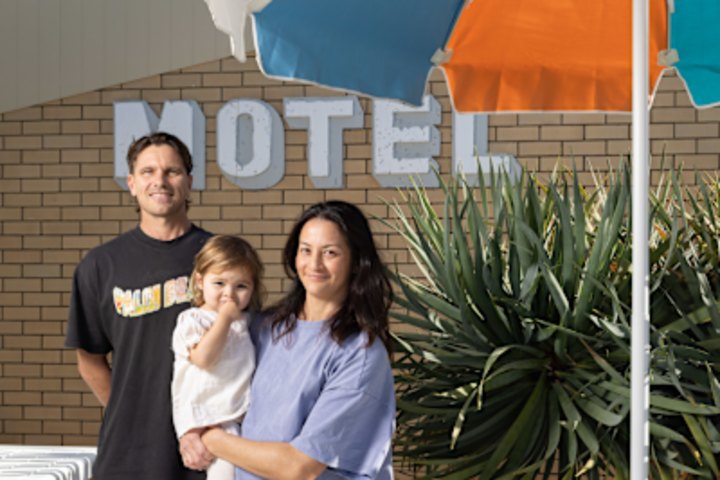 Jason and Eliza Raine, with their daughter Gigi, rescued the former Palm Beach Motel on the Gold Coast from demolition in 2020.