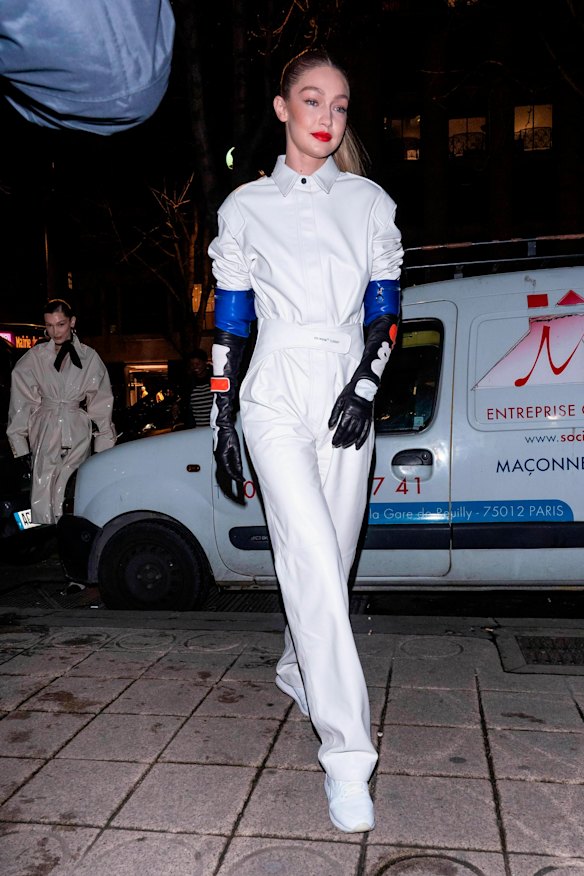 Gigi Hadid gives her boilersuit a moto-racing edge.