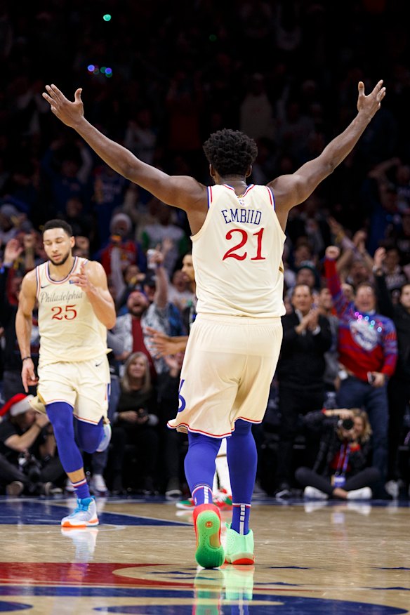 Embiid reacts to a Ben Simmons basket.