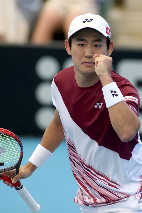 Japan’s Yoshihito Nishioka celebrates after clinching a point.