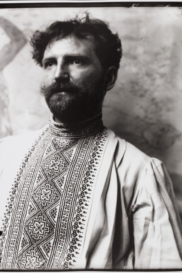 Self-portrait in a Slavic folk shirt at Mucha’s studio in rue de la Grande Chaumière, Paris, early 1890s.