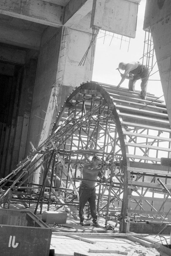 Workers rigging the scaffolding for the archway at the main entrance of the NGV, 1967.