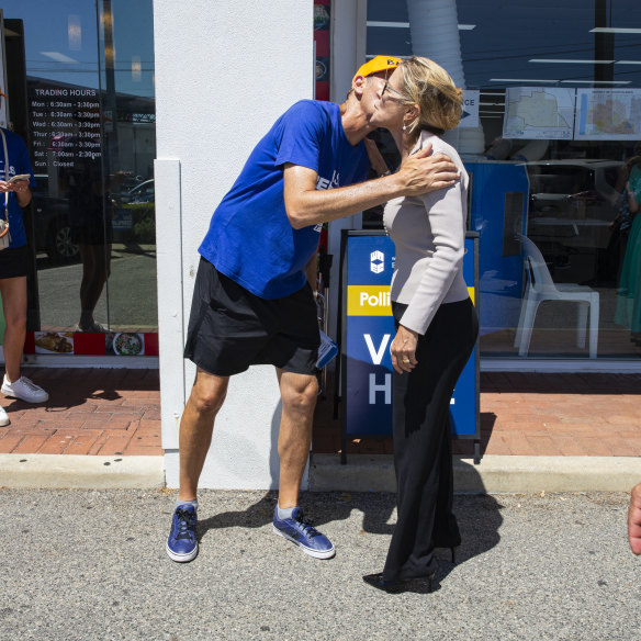 Churchlands candidate Basil Zempilas greets Libby Mettam at the Scarborough Beach Road polling booth.