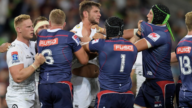 A fight breaks out between team captains Adam Coleman of the Rebels and Ruan Botha.