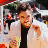 Boys pairs cheese on a stick with a fresh lemonade.